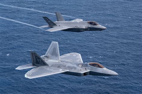 f 22 raptors world s most powerful fighter jets deployed to asia in big numbers to counter