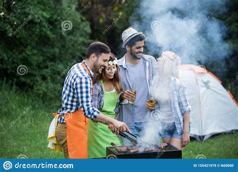 Group Of Friends Having Fun In Nature Doing Bbq Stock Image Image Of Happy Outdoor 155421979