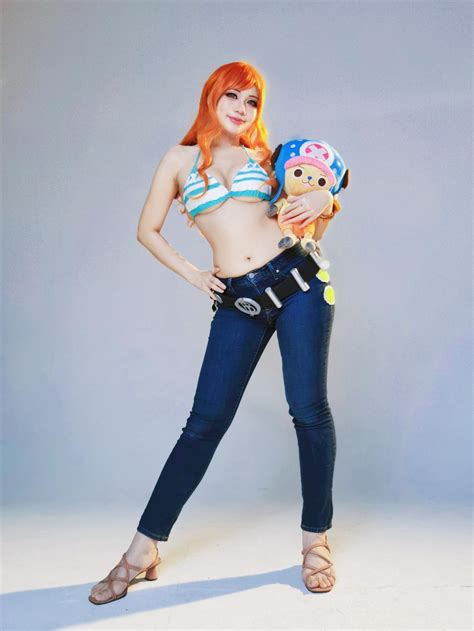 sharing my nami cosplay katykatcupcake made modified the belt bra and jeans too 💖 r onepiece