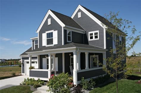 Your home's exterior color scheme plays a pivotal role in its overall look and feel. color scheme | Gray house exterior, House paint exterior ...