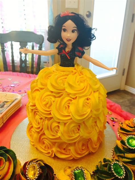 This cake is fun and. Snow White doll cake made with buttercream rosettes for a ...
