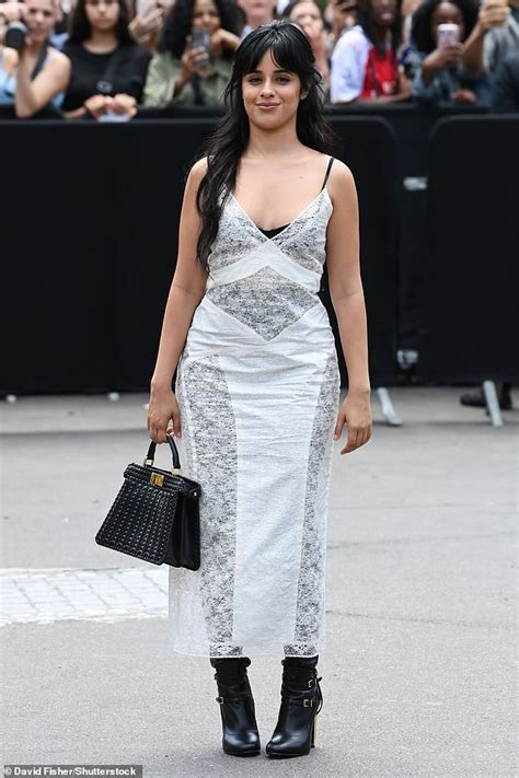 camila cabello dazzles in a sheer lace dress with black underwear as she attends fendi show