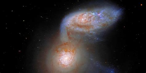Cosmic Show Of Interacting Spiral Galaxies Clicked By Hubble Helewix