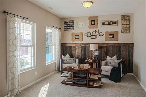 We spent the last several days putting together the wood wall project. Fischer Homes - Denali Model Living Room - Like the half ...