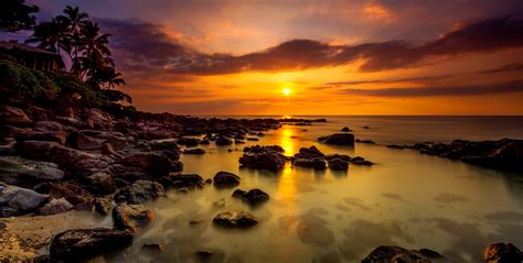 Rocky Beach Sunset Wallpaper And Background Image