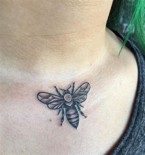 Small Bumble Bee Finger Tattoo
