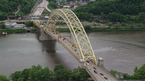 48k Stock Footage Aerial Video Orbiting Fort Pitt Bridge Downtown