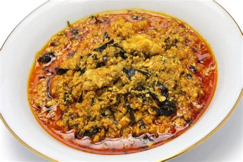 Add the smoked fish, stockfish, blended crayfish, meat, and locust beans spice and cook for 10 minutes. How to Make Nigerian Egusi Soup Recipe | Egusi Soup ...