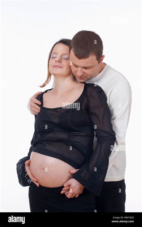 Expecting Couple Man Touching His Pregnant Wifes Belly Stock Photo