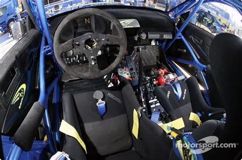 In nascar simracing, the garage screens allow the player to adjust their setup to suit the characteristics increase or decrease your 4th gear ratio so that the rpm warning light in the cockpit (also • for short tracks, speedways and superspeedways where you always turn left, a nascar. The cockpit of Petter Solberg's Subaru Impreza WRC04 at ...