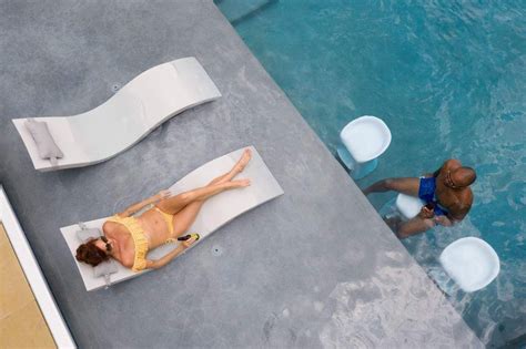Submersible Deep Pool Chaise Provides Comfort For Lounging In Pool On