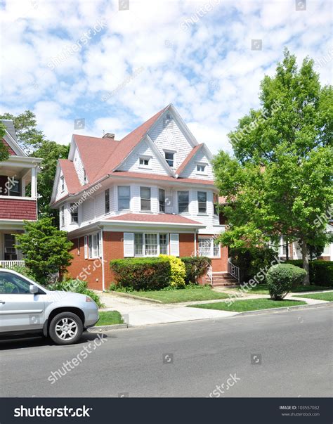 Beautiful Suburban Victorian Style Home On Stock Photo ... Une selection de 32 photos de maisons de styles différents!