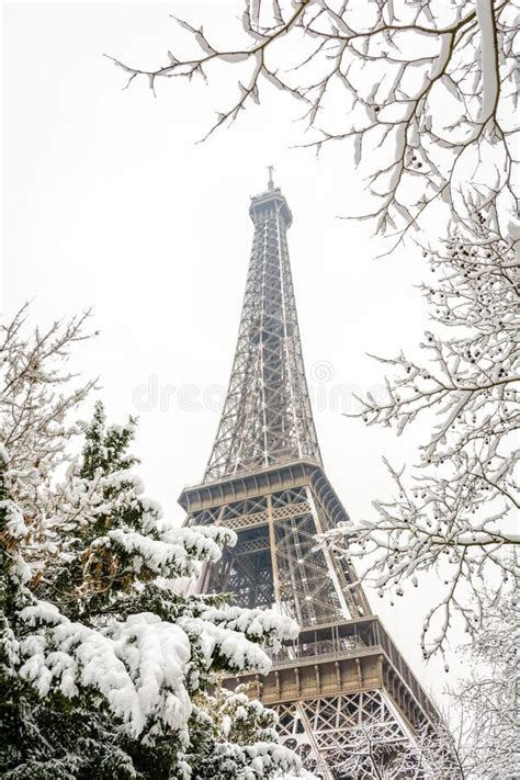 The Eiffel Tower On A Snowy Day In Paris France Stock Image Image Of