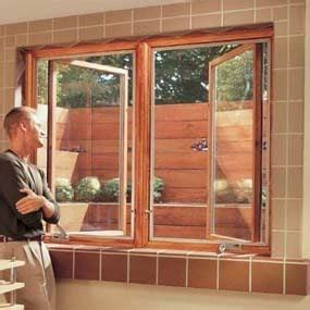 How to Install a Terraced Window Well in Your Basement
