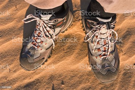 Closeup Hiker Feet On A Sand Stock Photo Download Image Now