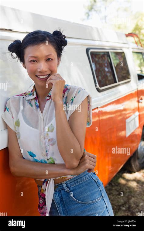 Portrait Of Woman Leaning On Camper Van In The Park Stock Photo Alamy