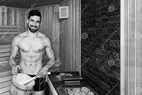 Handsome Man Pouring Water On Hot Rocks In Sauna Stock Image Image Of Caucasian Black 71181705