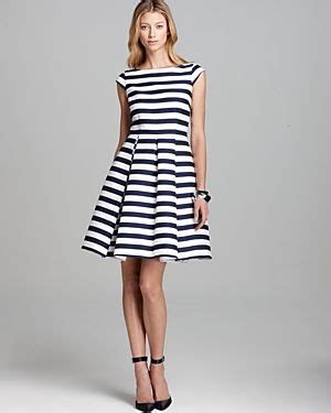 Skinny breton stripes are a staple of classic french style—inspired by sailors, they became a signature part of the tomboyish gamine look a bodycon dress gets a dose of stylish elegance from black and white twin stripes. WISHLIST: Kate Spade New York