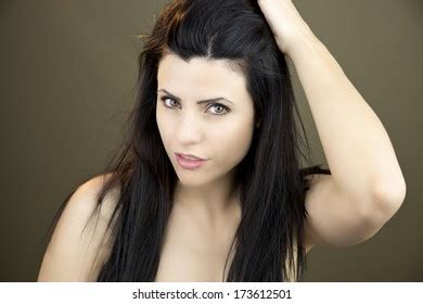 Gorgeous Woman Touching Long Hair Naked Stock Photo