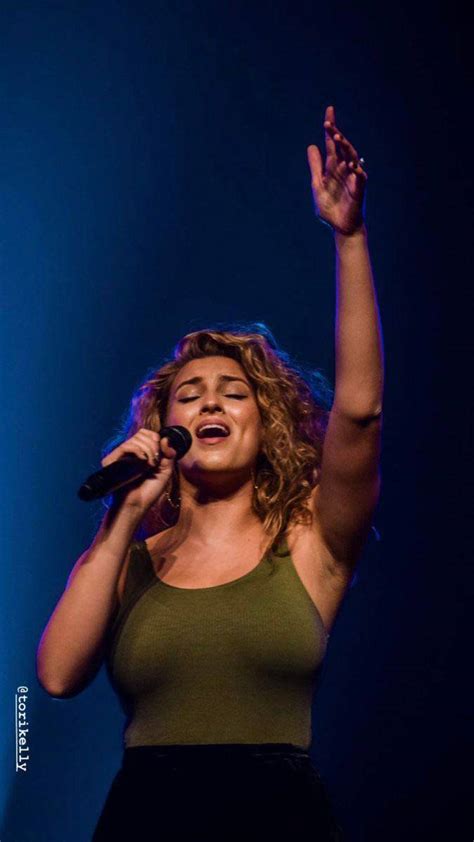 Tori Kelly Singing At A Show In Scrolller