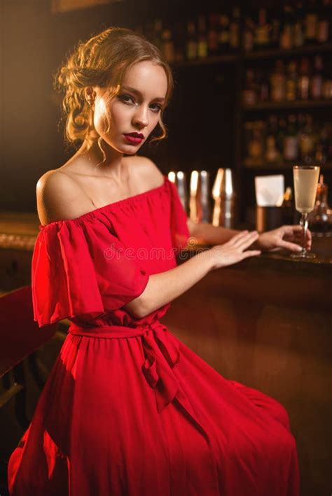 Woman In Red Dress Standing At The Bar Counter Stock Image Image Of