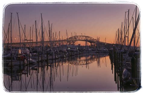 Auckland Harbour Bridge And Westhaven Marina At Sunrise