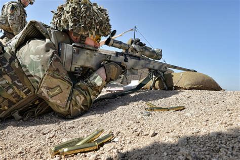 Military Armament British Army Sniper Training With His L96a1 Sniper