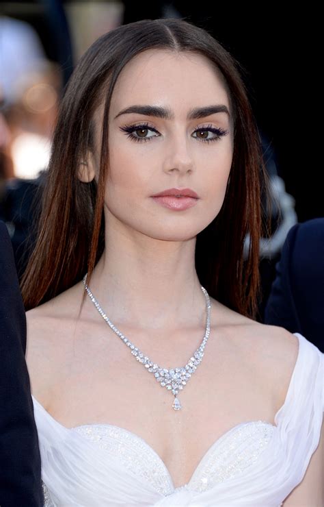 The Inspiration Behind Lily Collinss Cannes Film Festival Beauty Looks
