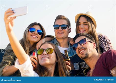 Group Of Friends Taking A Selfie With Smartphone Stock Image Image Of Phone Shades 46848831