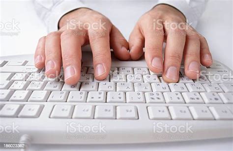 Man Typing On A Computer Keyboard Stock Photo Download Image Now