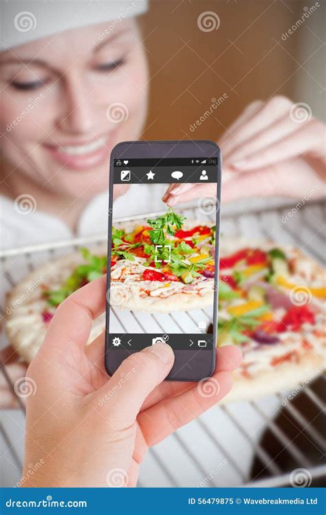 Composite Image Of Female Hand Holding A Smartphone Stock Image Image