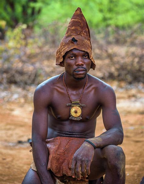 Member Of The African Tribe Himba Traditionally Dressed In Opuwo