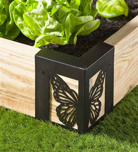 Rugged powder coated steel corner brackets hold up to 2in x 12in planks together for a permanent raised garden bed frame (2 x 12 in lumber; Steel Raised Garden Bed Corner Brackets in Butterfly ...