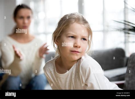 Sulky Angry Offended Kid Girl Pouting Ignoring Mother Scolding Her For