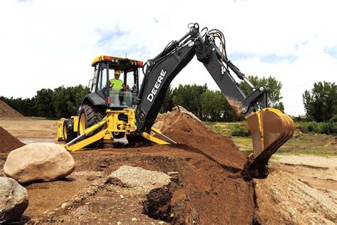 The New 710l John Deeres Largest Backhoe Gets A Power Boost