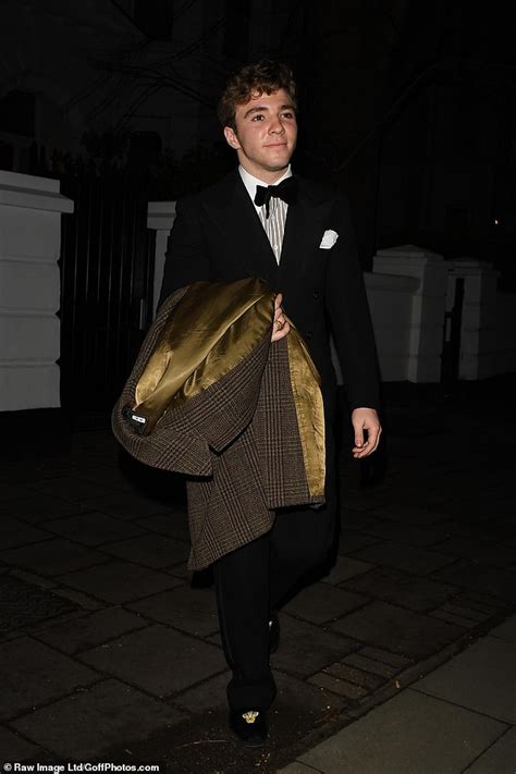 Rocco Ritchie Puts On A Cosy Display With Mystery Girl As They Depart Cabaret Club In Early