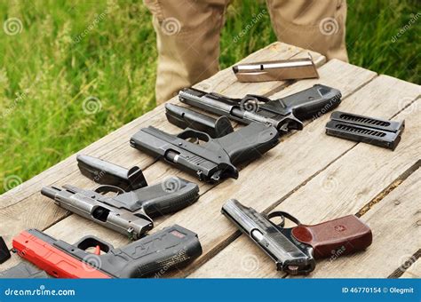 Portable Guns On The Table Editorial Photo 46770063