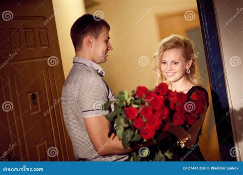 Man Gives Roses To A Girl Stock Photo Image Of Male 27441324