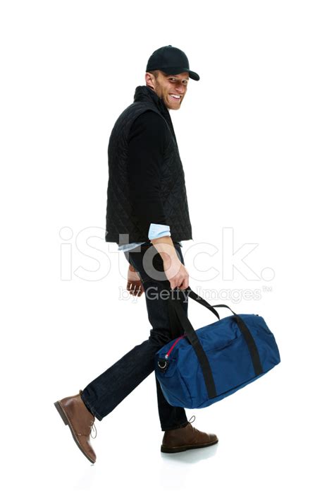 Smiling Man Walking With Gym Bag Stock Photos