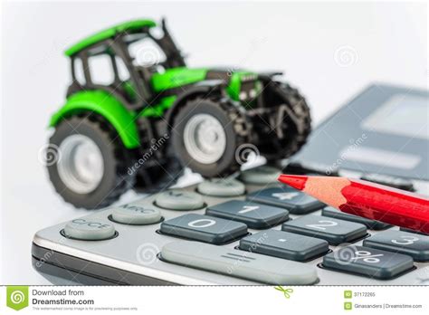 Looking for the cheapest rates on insurance for your pickup truck? Tractor, Red Pen And Calculator Stock Image - Image of investment, expenditure: 37172265