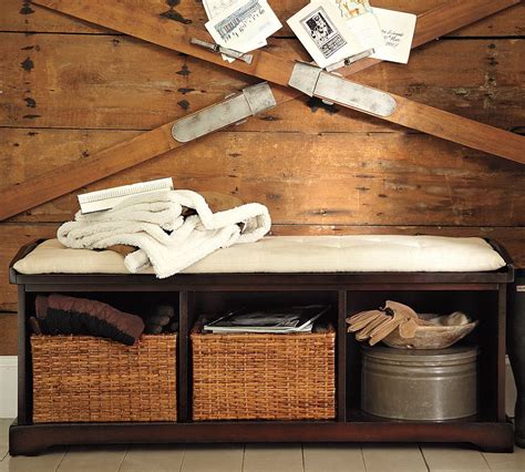 It's a perfect place for all your hats, scarves, mittens, dog leashes, and other things you need to conveniently grab when you're heading out the door. POTTERY BARN INSPIRED DIY ENTRYWAY BENCH
