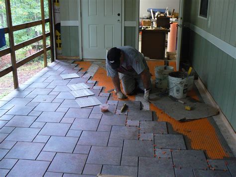 Basic instruction on how to use a 12 by 18 floor sander on a wood deck floor. Wood Porch With a Tile Deck | Professional Deck Builder