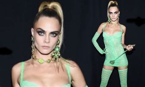 Cara Delevingne Rocks Sheer Mint Lingerie And Brandishes A Whip Daily Mail Online