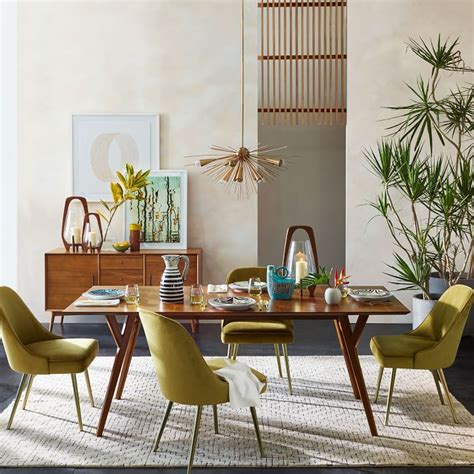 While it's pricier than other similar drop leaf options, the sturdy, sleek, and stylish look makes it worth the higher price tag. West Elm Mid-Century Expandable Dining Table Review - Furnished Reviews