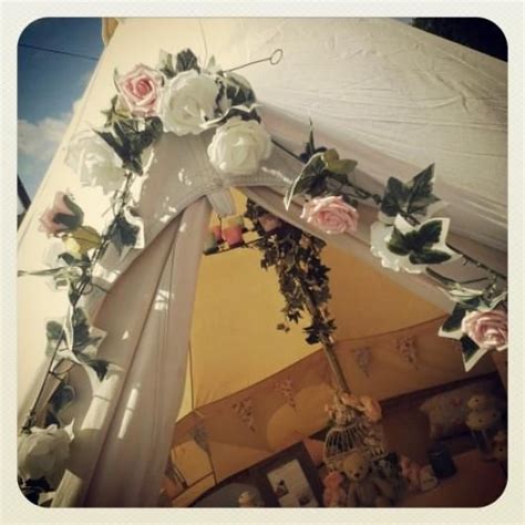 floral garland decorating front of bell tent floral garland bell tent garland
