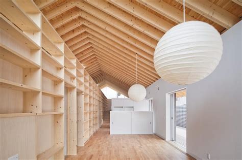 Include (or exclude) results marked as nsfw. House With Exposed Timber Rafters And Bookshelf Columns