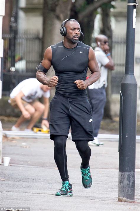 Idris Elba Sprints Through London In Workout Gear While Shooting Scenes
