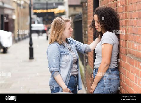 Lesbian Girl Trying To Cheer Up Her Upset Girlfriend Stock Photo Alamy