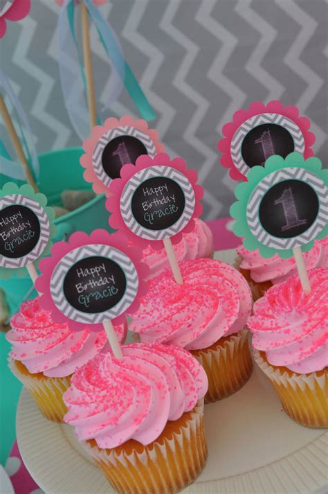 For the birthday cake decorations cover it with black icing. 1st Birthday Cupcake Toppers - Girls 1st Birthday ...