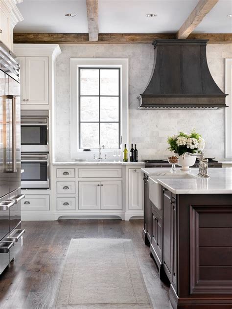 French Country Kitchen With Reclaimed Wood Beams And Zinc French
